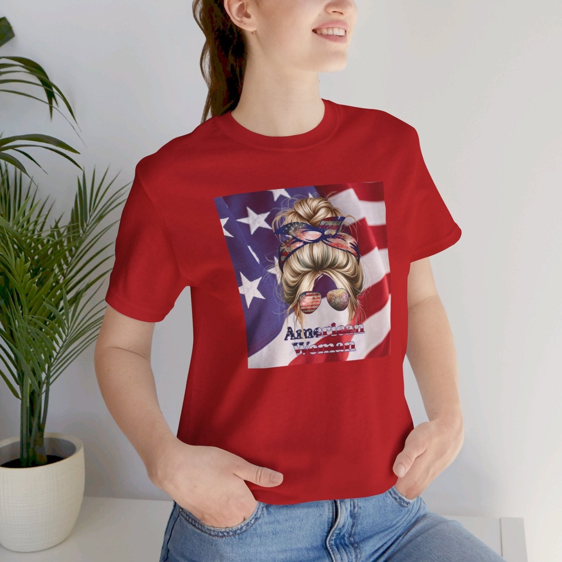 American Woman, Blond Hair, Flag Background, Unisex Jersey Short Sleeve Tee - Janlyn's Crafts